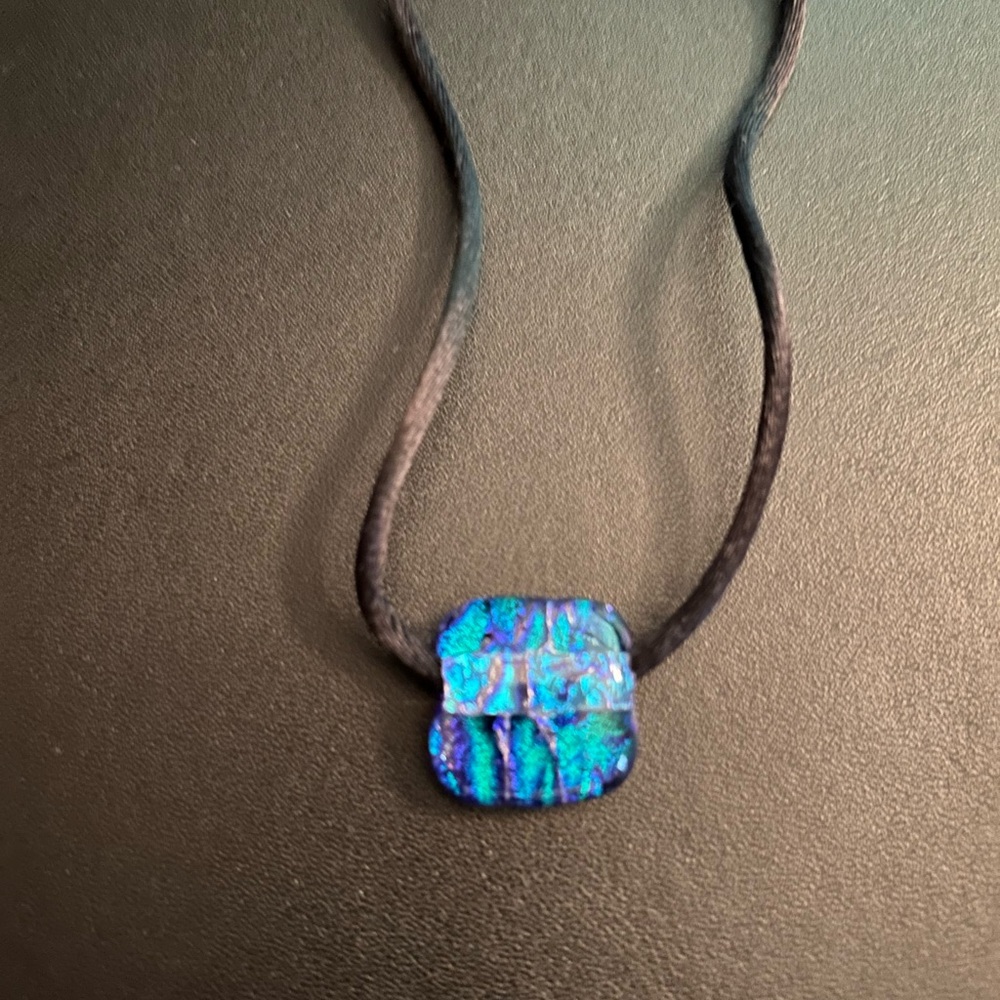 Dichroic Glass on a Satin Cord.